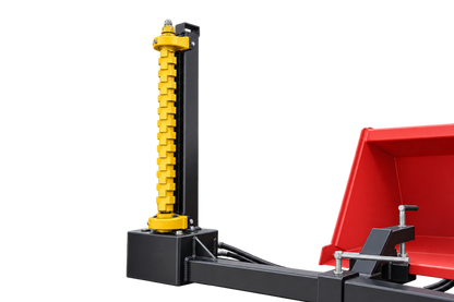 Quick Attach Bucket Mount Limb Cutter attached to a red bucket, with a vertical yellow cutting rotor and black mounting frame.