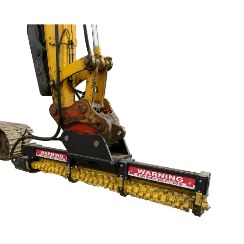 A yellow excavator limb cutter attachment with a long horizontal drum and warning labels.