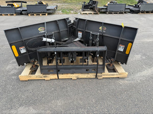 Large black agricultural implement on a wooden pallet with visible branding, set against an outdoor background.