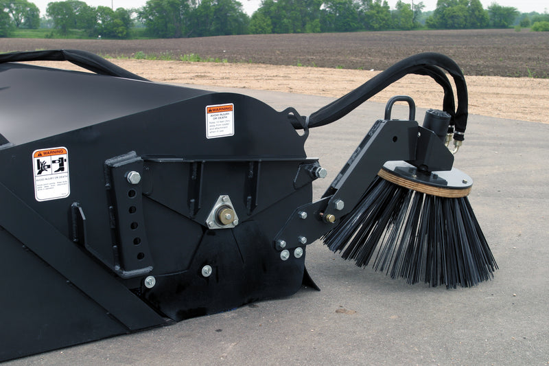 Optional curb sweeper (with steel bristle) can be moved up when not needed. (poly bristle sold separately)